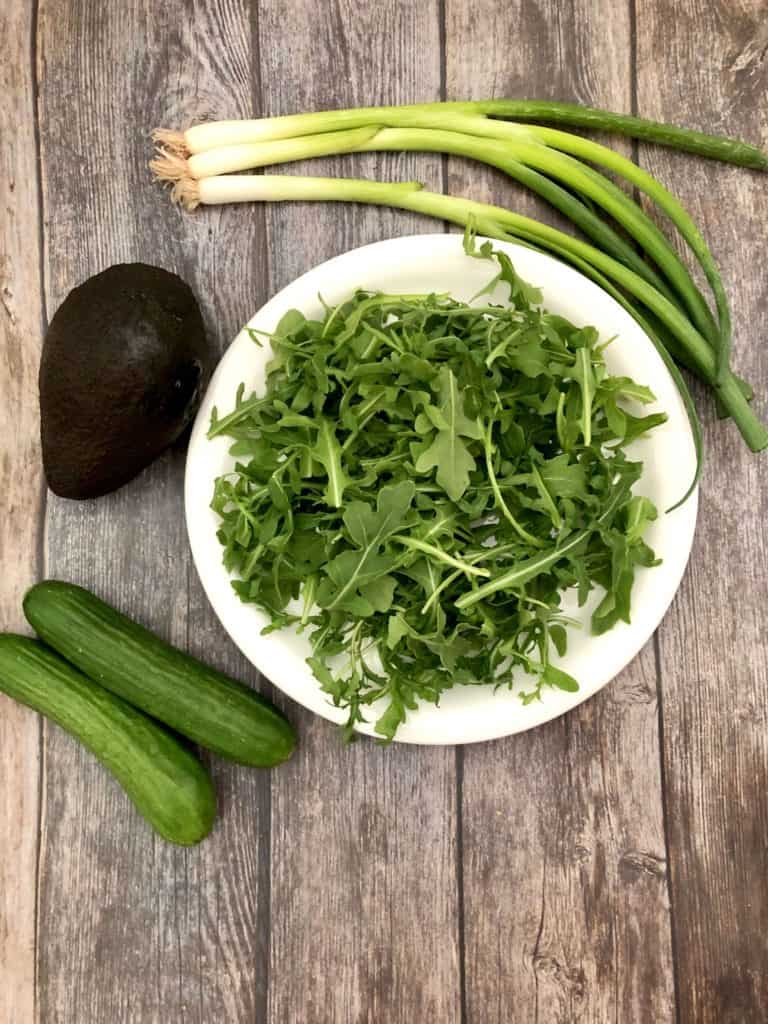 chomped arugula cucumbers,avocado and green onion