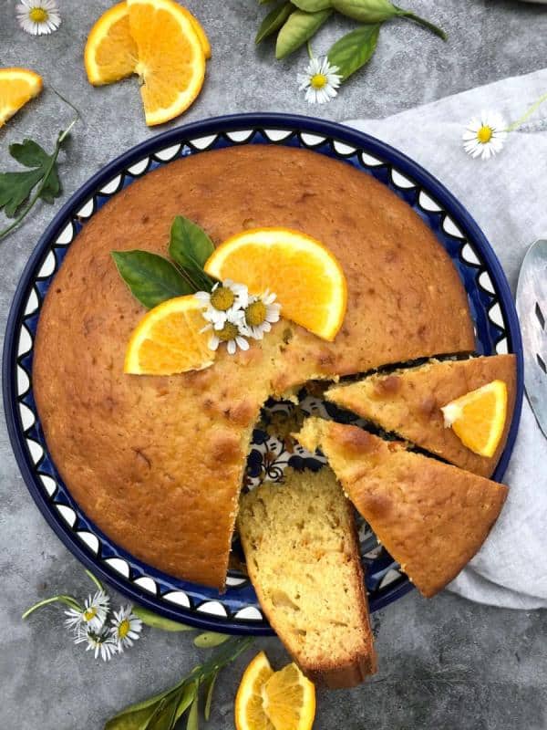 orange cake three slices on serving dish