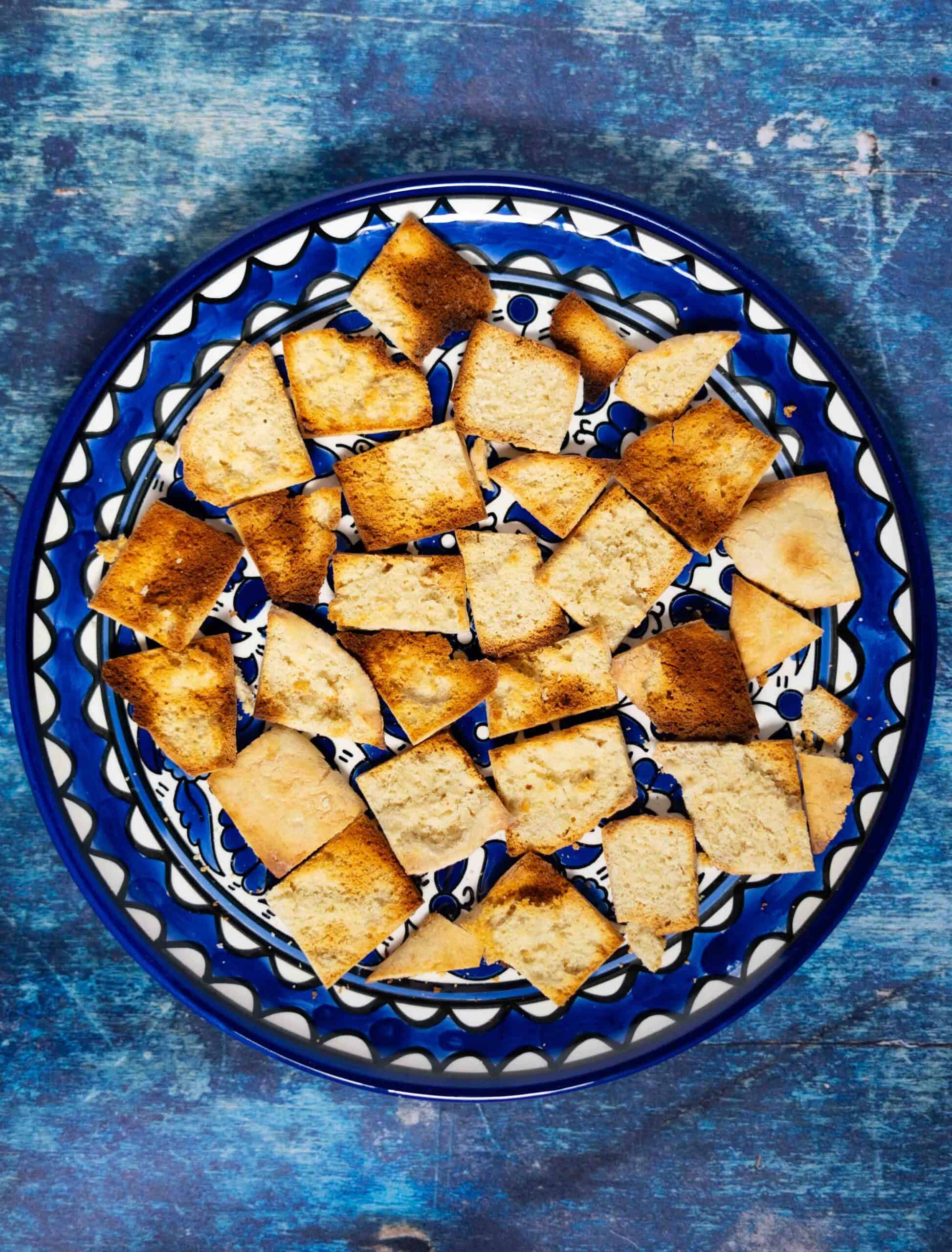 Toasted bread spread on a round shape plate