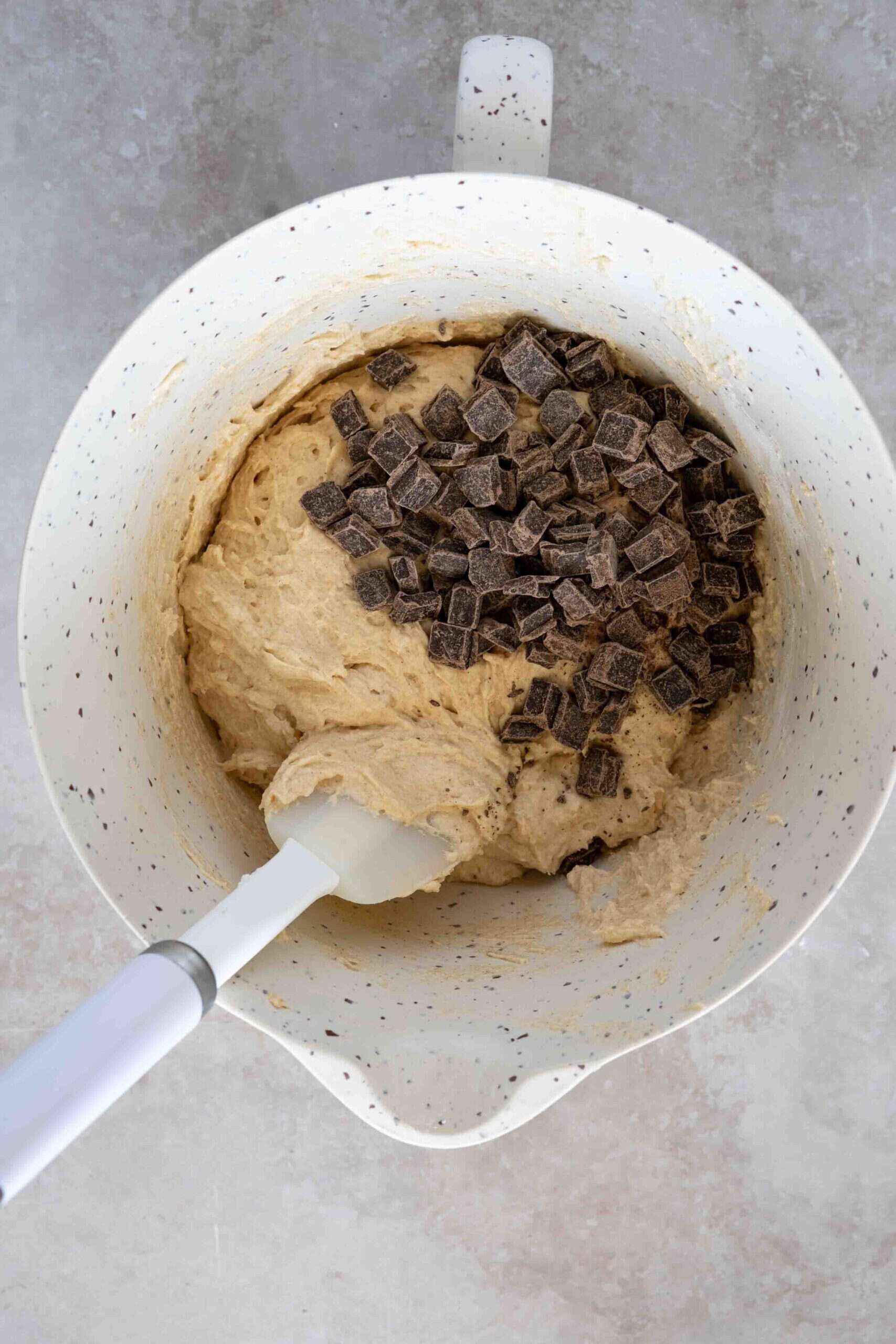adding chocolate chunk over the mixture