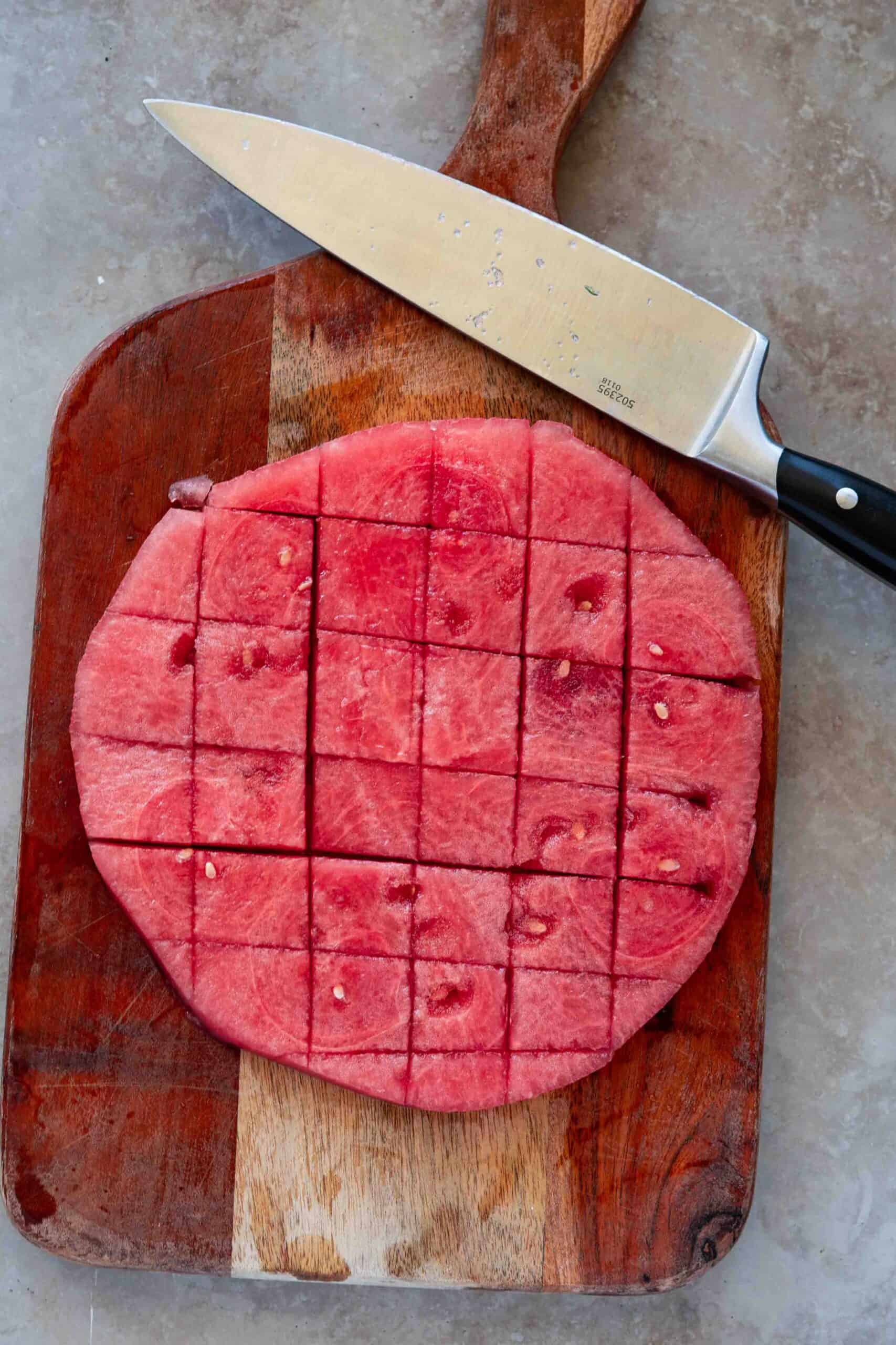 Watermelon round big slice with skin off sliced into squares