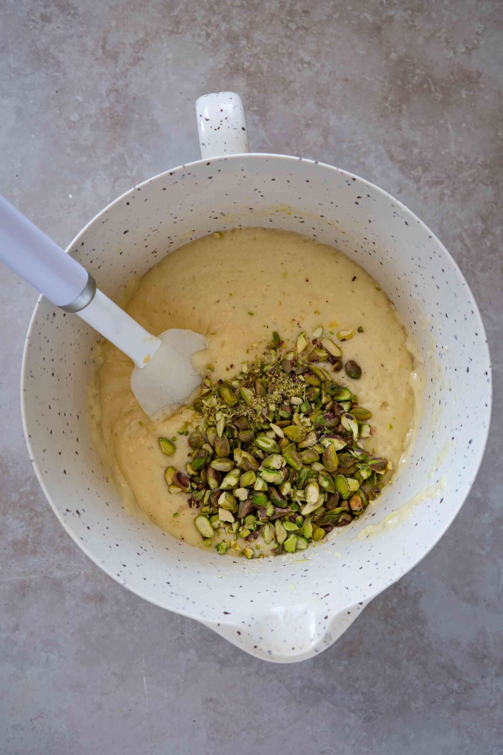 A bowl filled with pista and other ingredients.