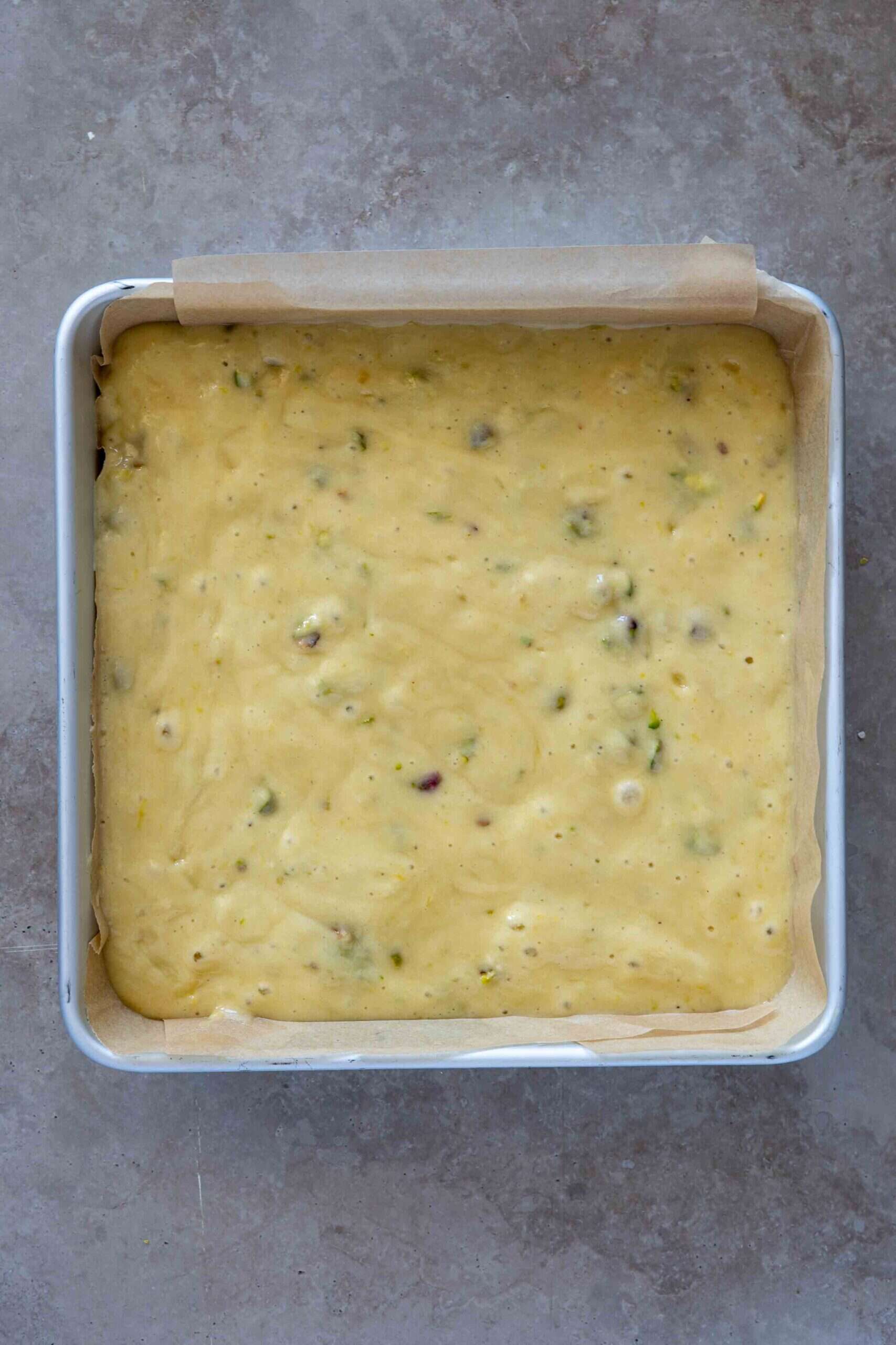 Cake batter in baking tray before baking