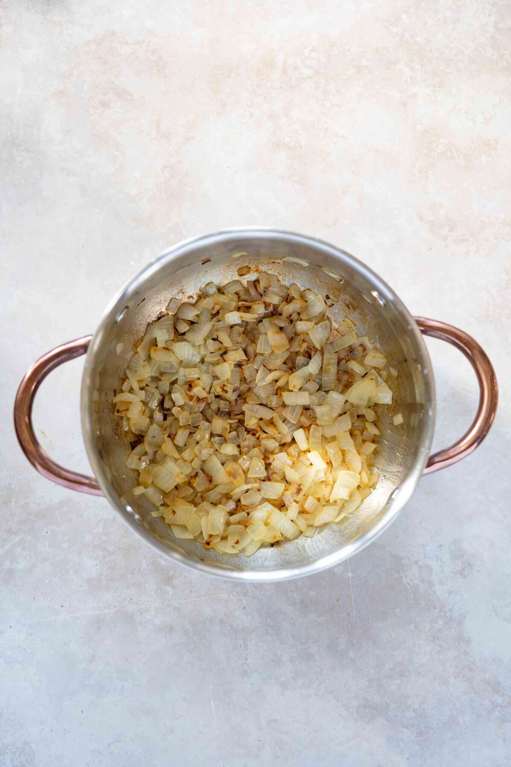 sautéed onions in a pot.