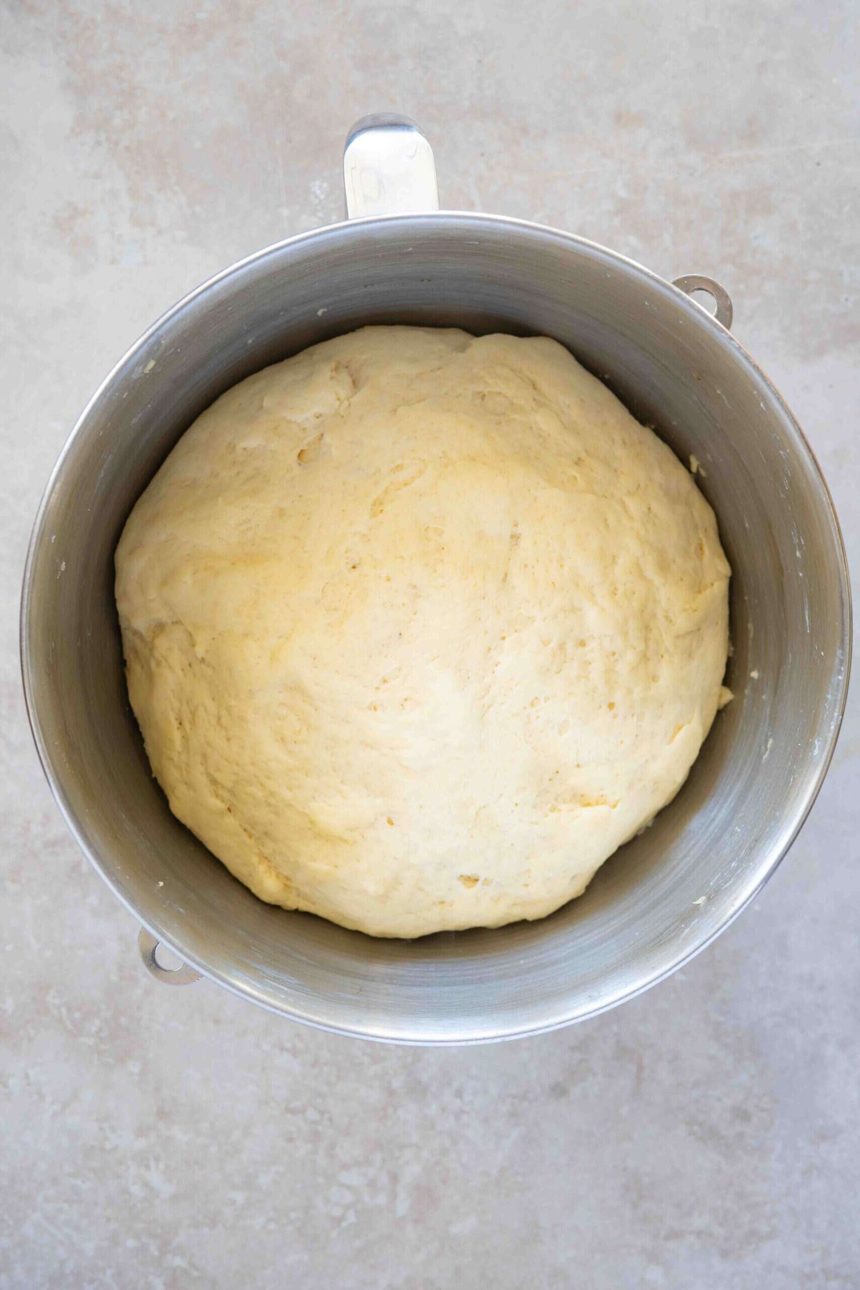 Dough in a large bowl after rising