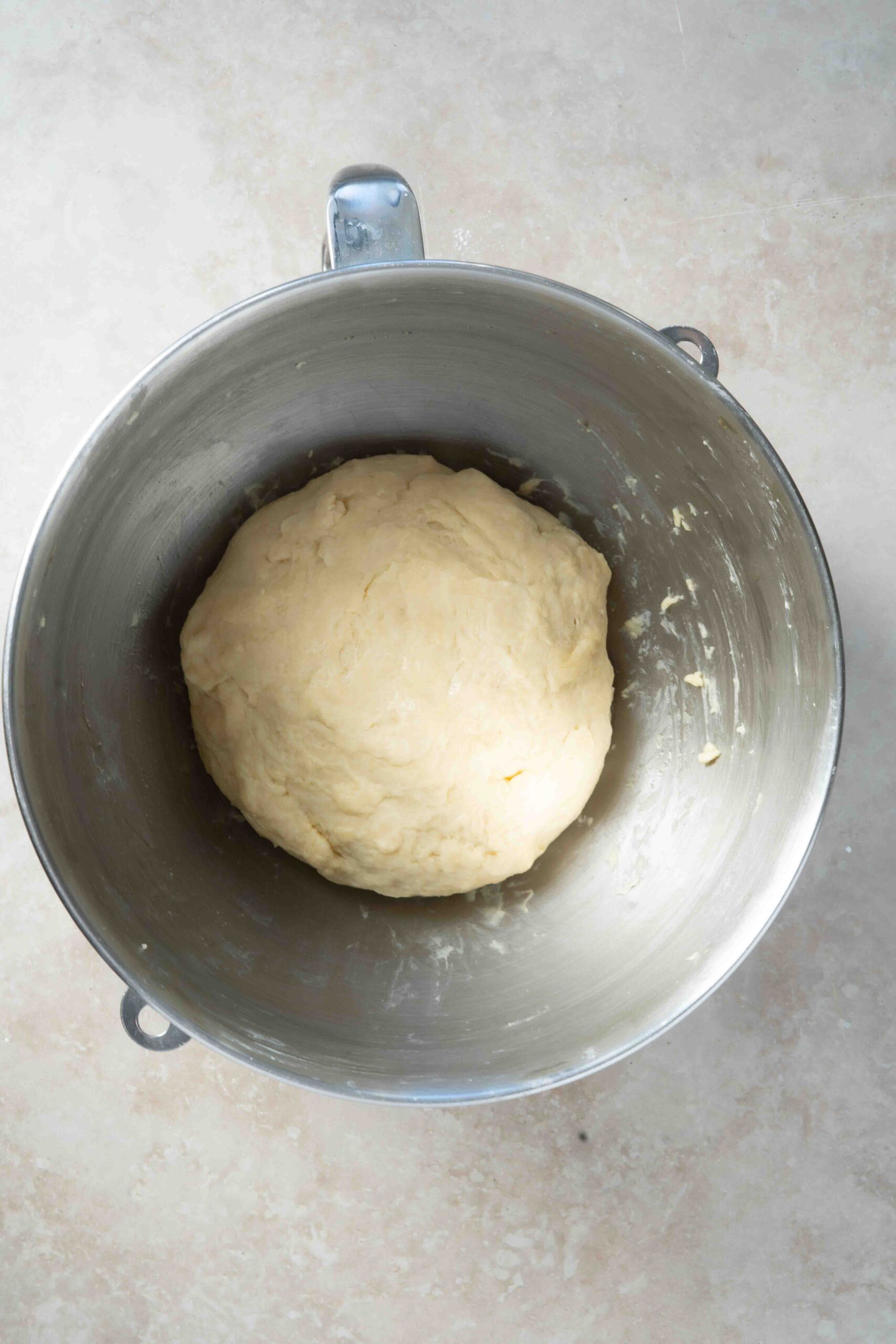 Dough in a large bowl before rising