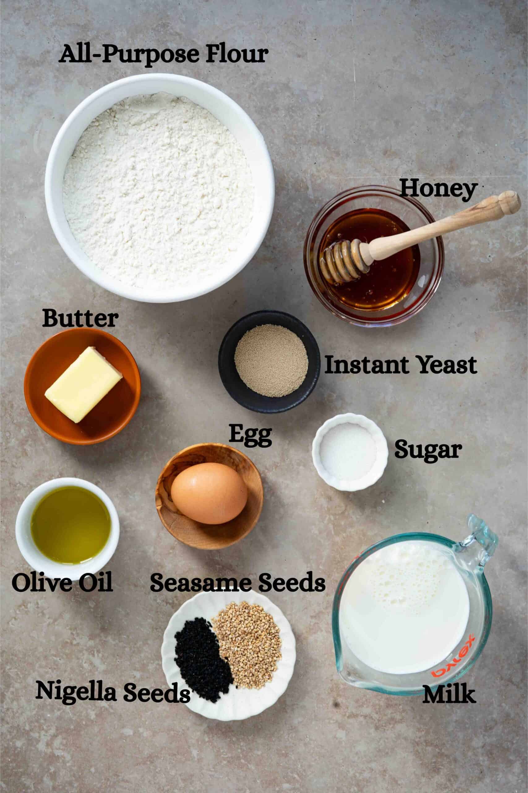 Honeycomb bread ingredient: All-purpose flour, butter, olive oil, egg, milk, instant yeast, sugar, sesame and nigella seeds for garnishing