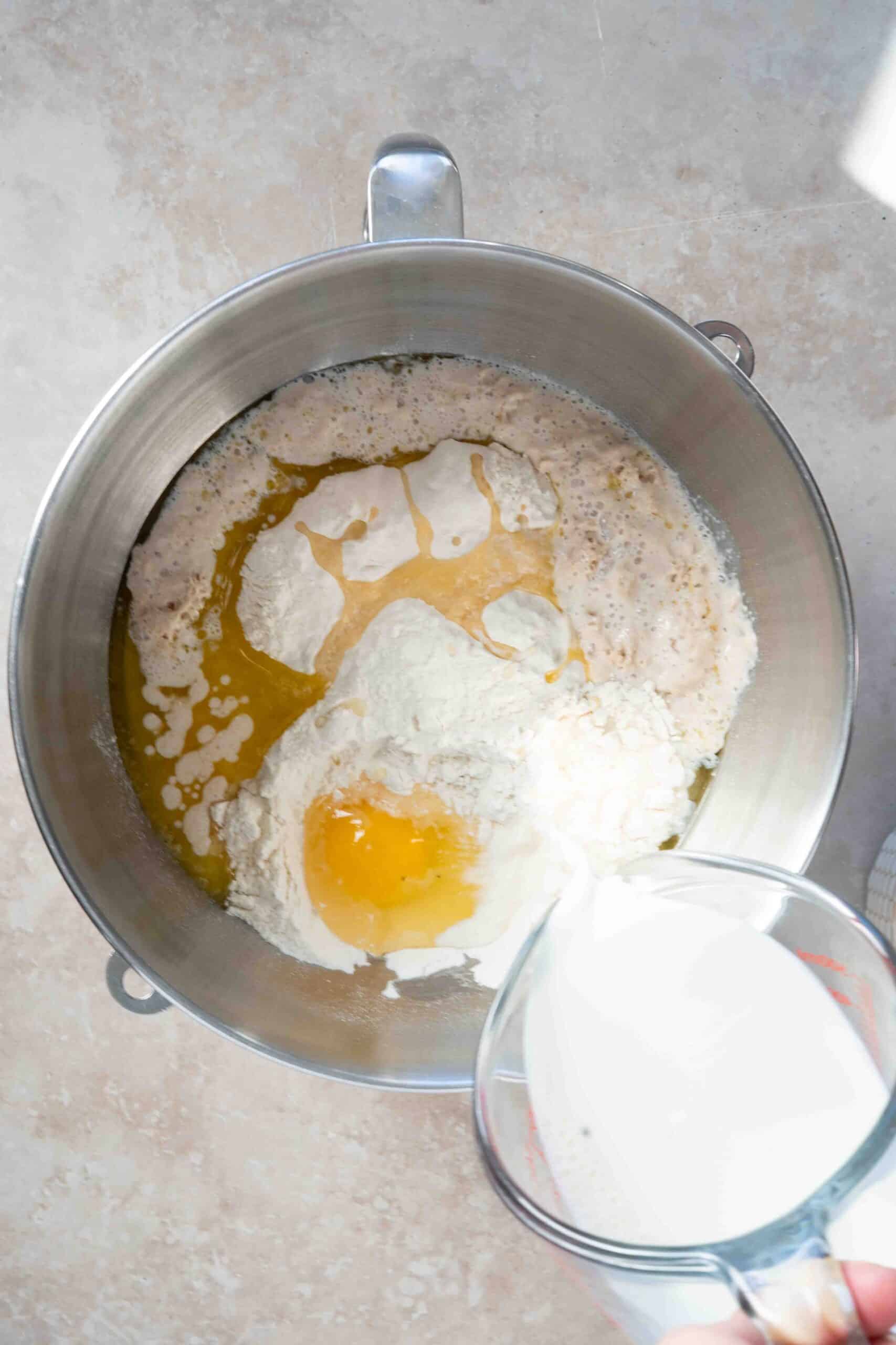 Pouring milk over ingredients