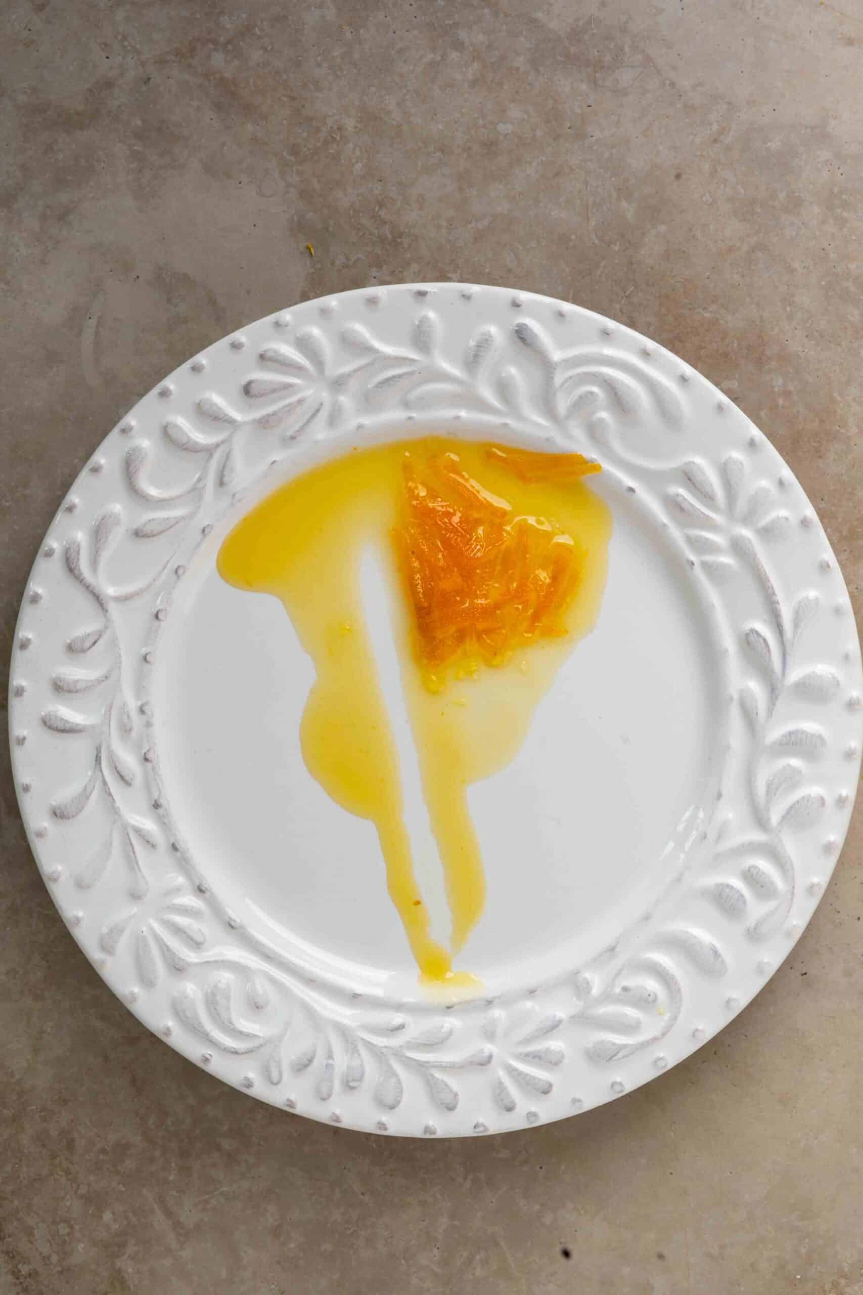 A small portion of jam on a plate to test its readiness.