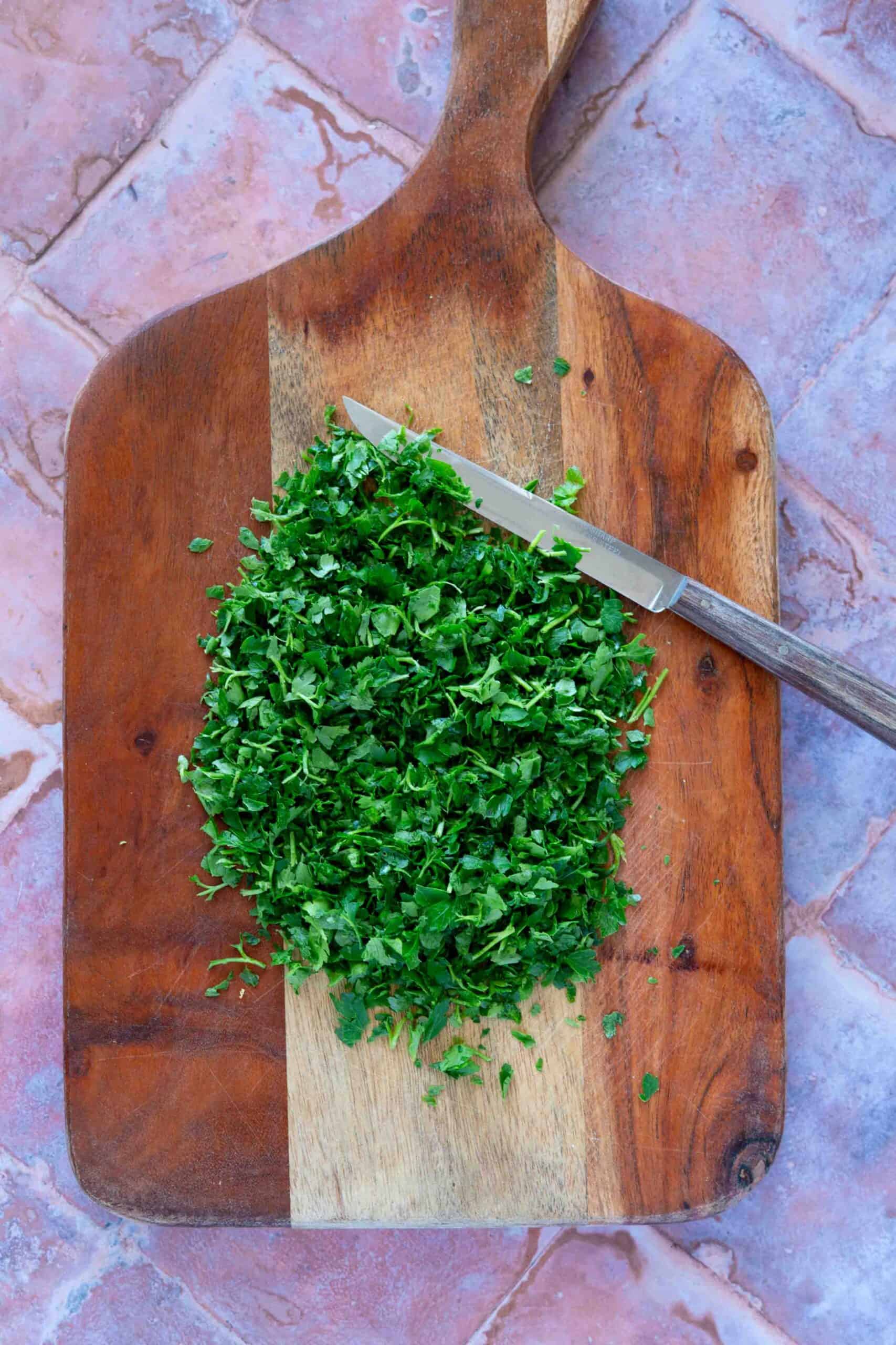 Parsley chopped on cutting board