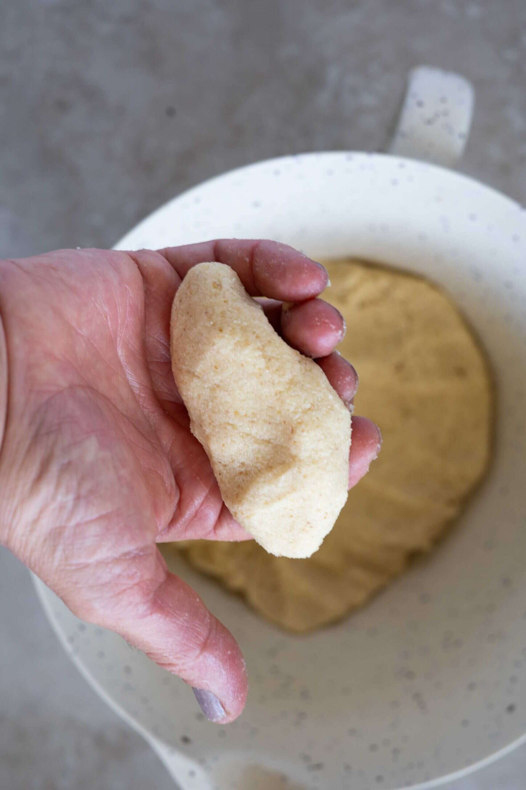 Mix the dough until it becomes soft, slightly stretchy, and easy to work with.