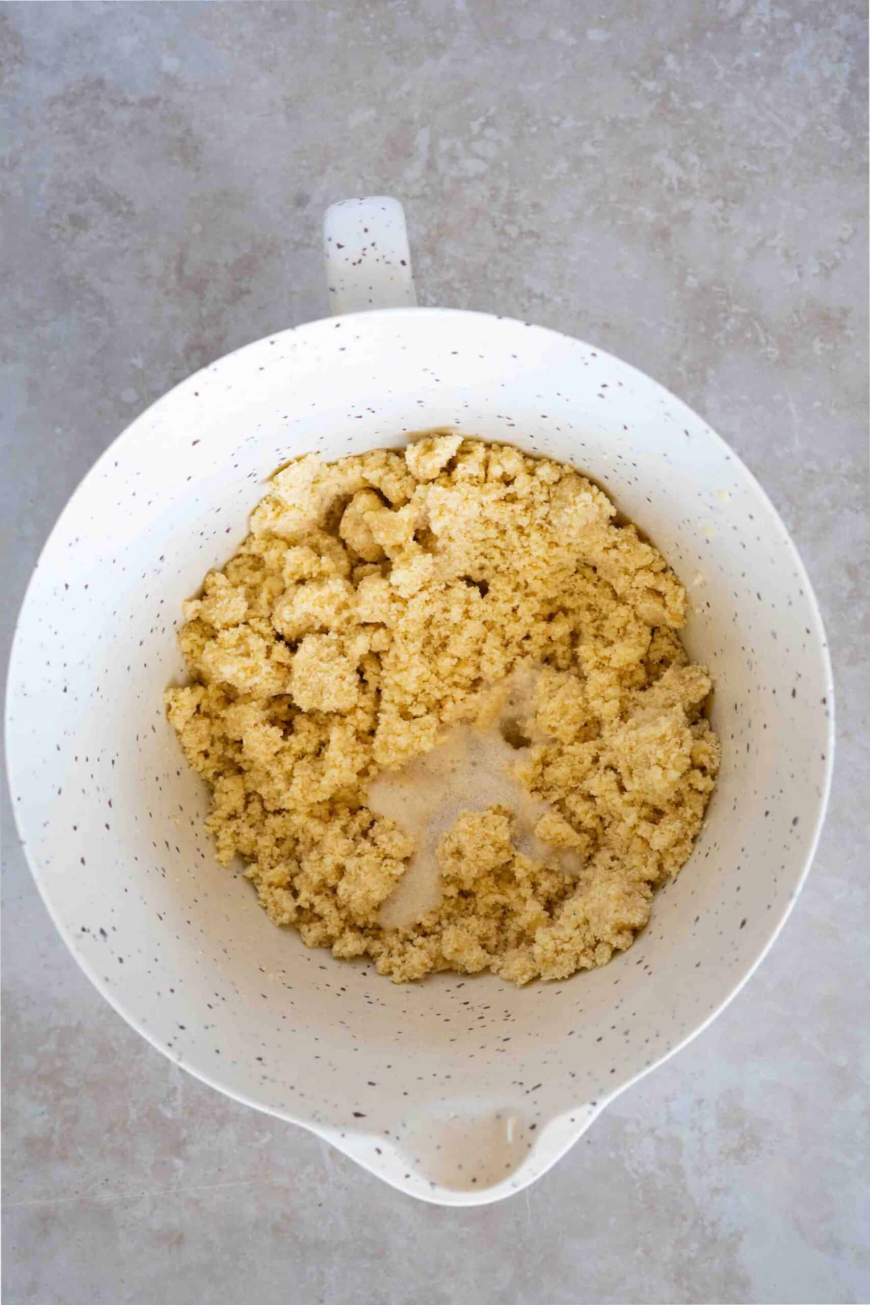 Pouring yeast mixture over farina mixture