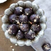 Tahini chocolate balls in a bowl - featured photo