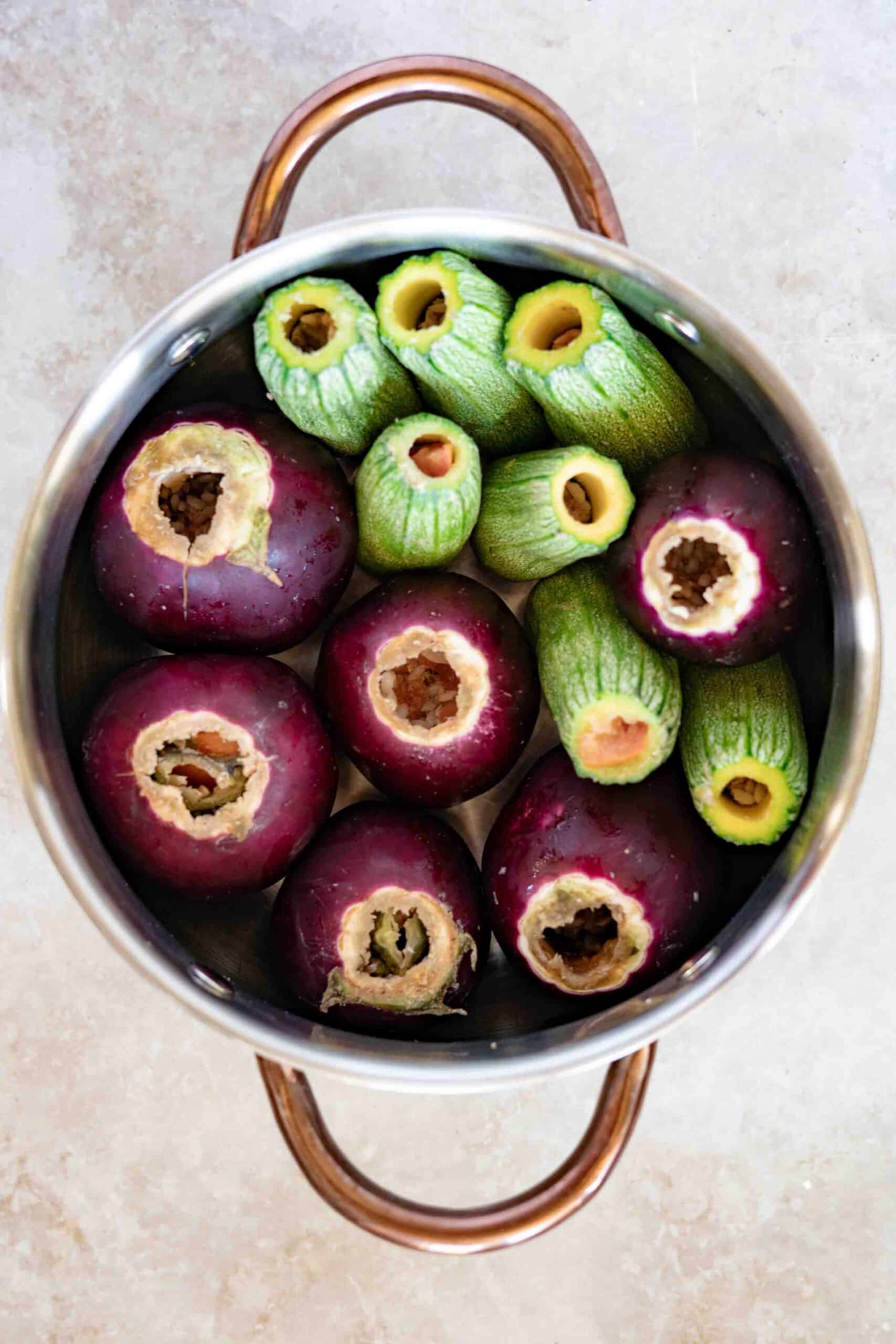 Eggplants and zucchini fully stuffed with spiced rice and meat