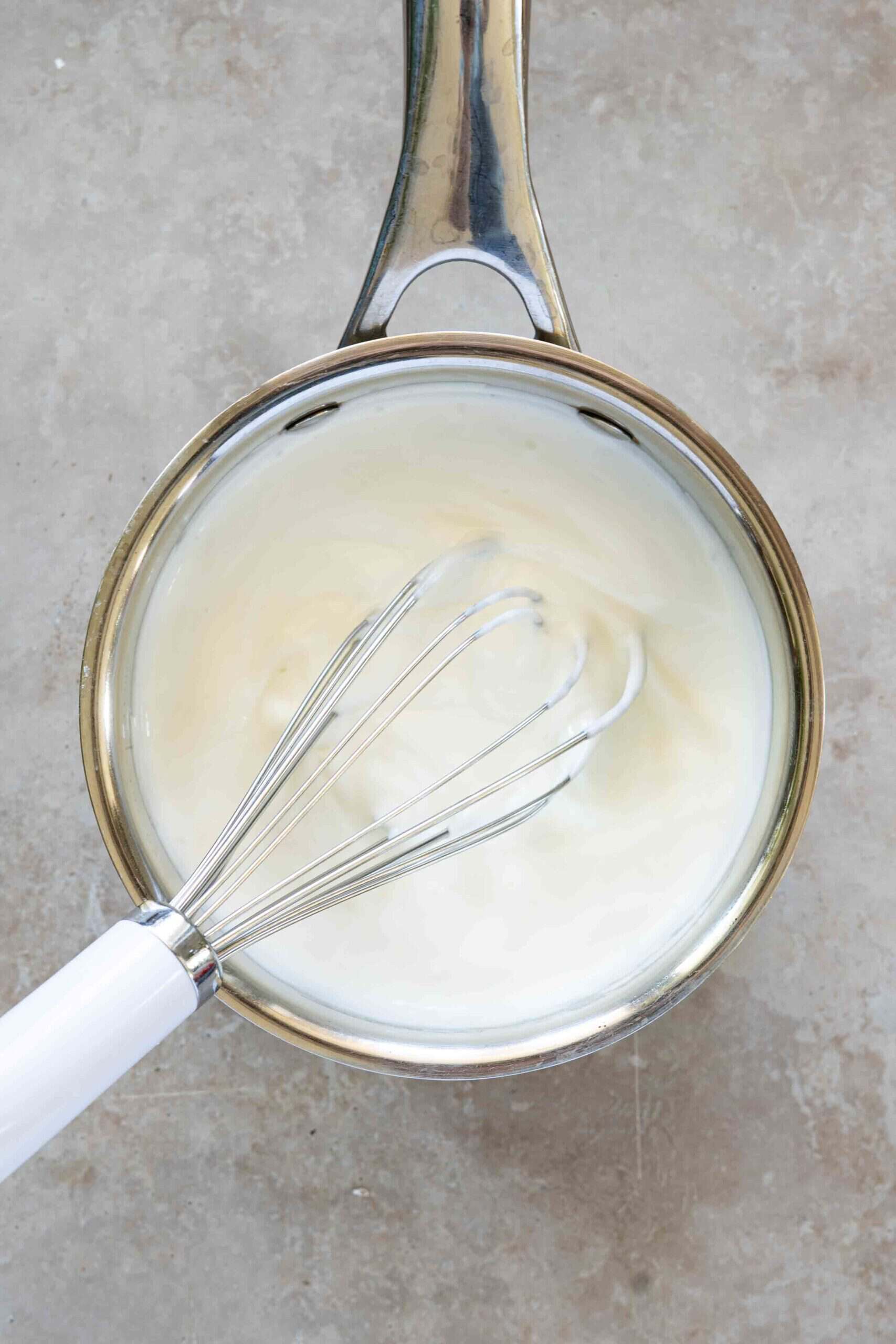 Yogurt mixed with cornstarch in a pot