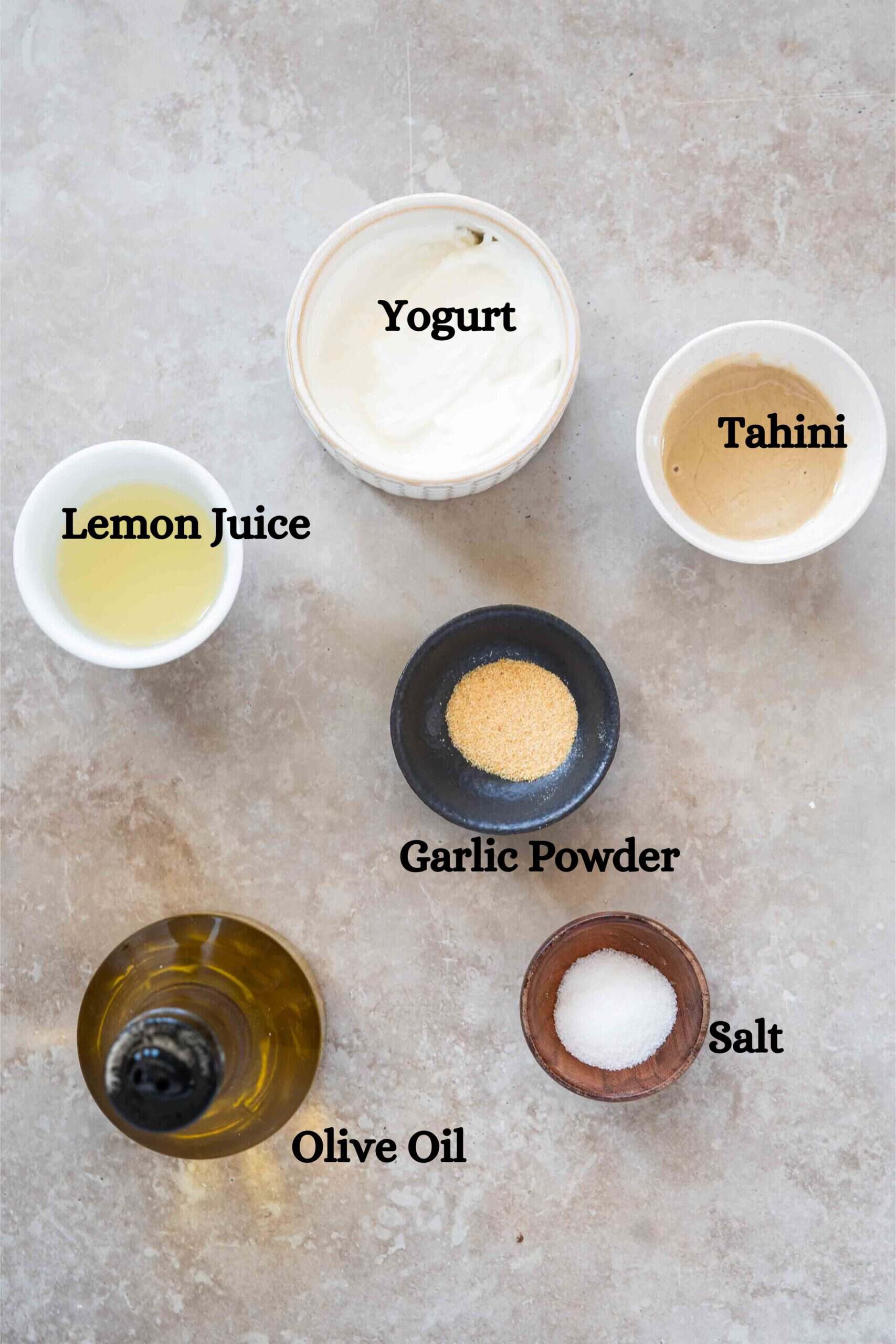Shawarma Sauce ingredients: plain Greek yogurt, tahini sauce, fresh lemon juice, garlic powder, salt and olive oil.