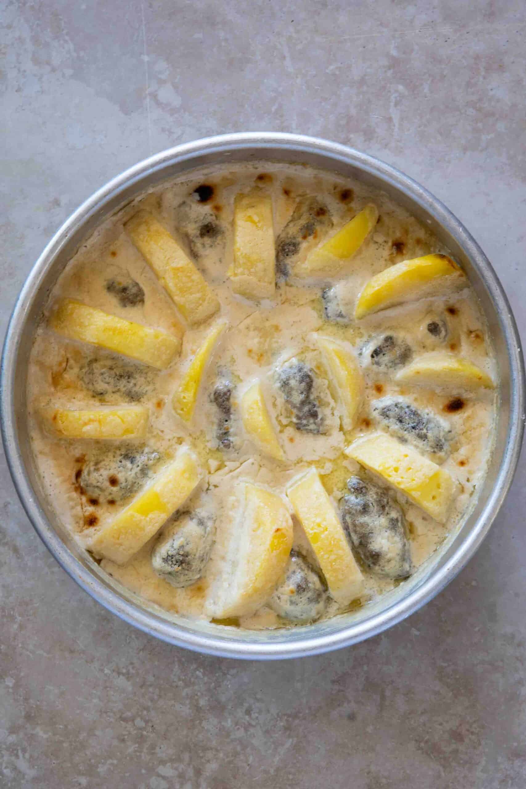 Kafta bil tahini in a baking pot after baking