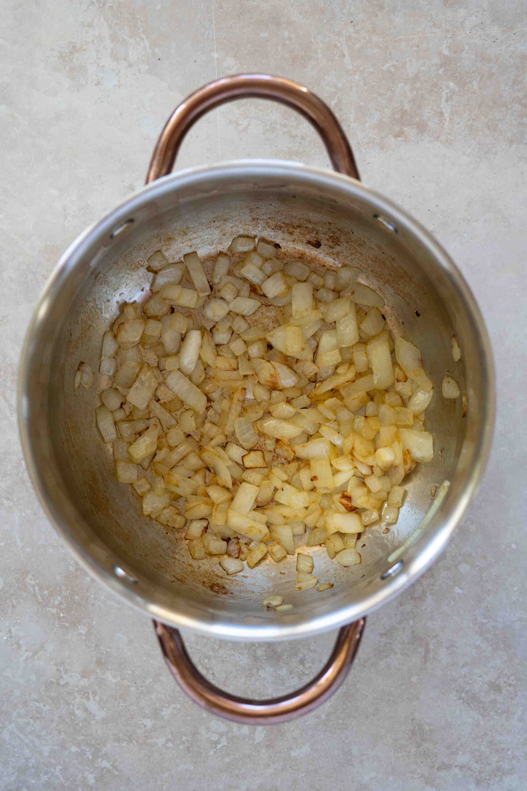 Onions sauteed with olive oil in pot